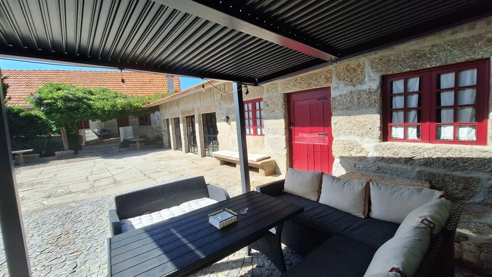 Traditional stone house and outdoor living